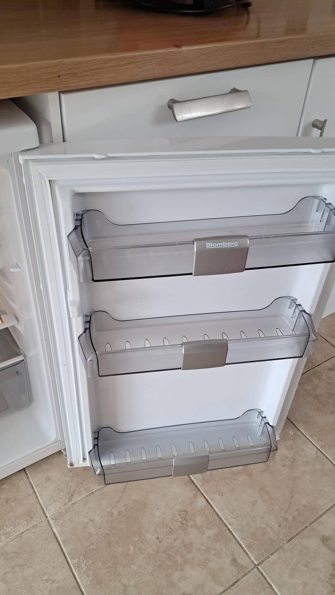 Fridge interior following the bungalow deep clean by Cyklone Cleaning